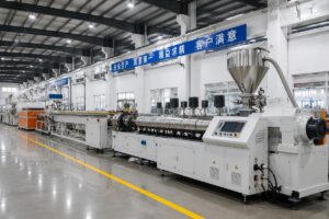A fully assembled plastic extrusion production line running in a newly built factory